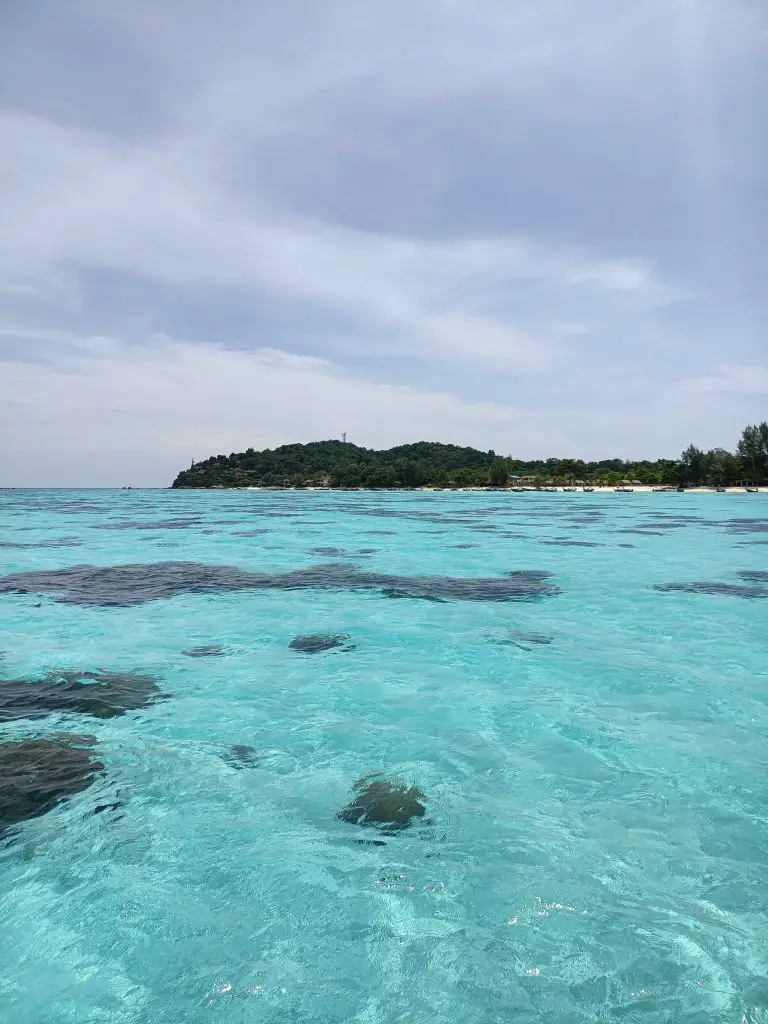 clear turquoise waters and submerged hidden reefs