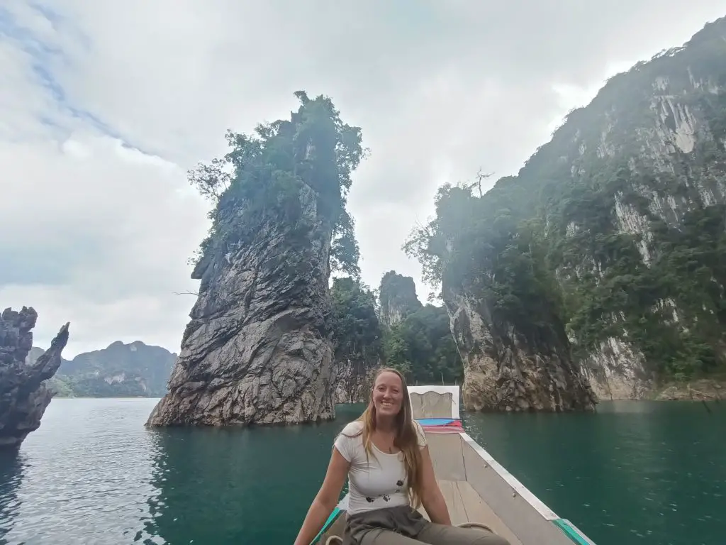 me sitting on a long tail boat in Khao Sok national park